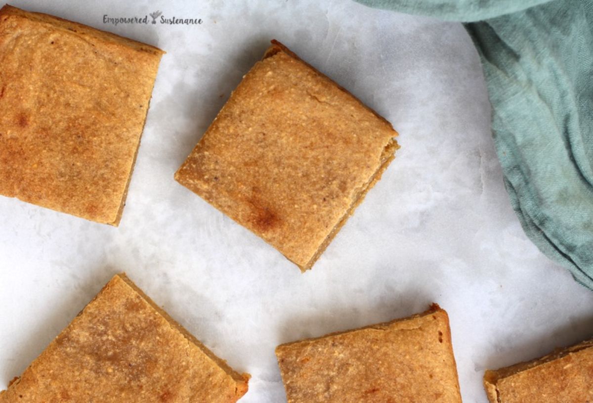 5 squares of plantain bread on a white surface