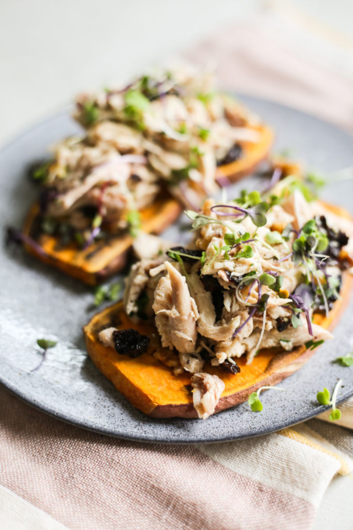 2 slices of sweet potato topped with chicken salad