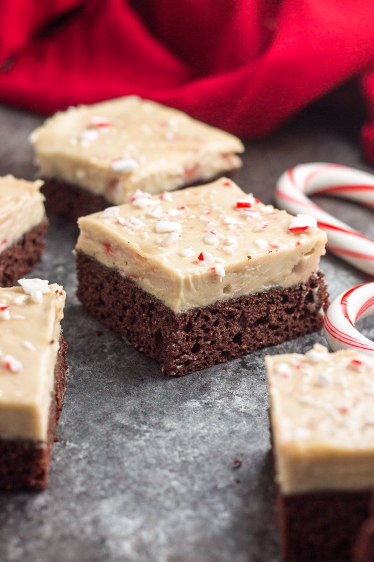 segments of peppermint brownie cheesecake bars