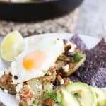 huevos rancheros with chorizo on a plate