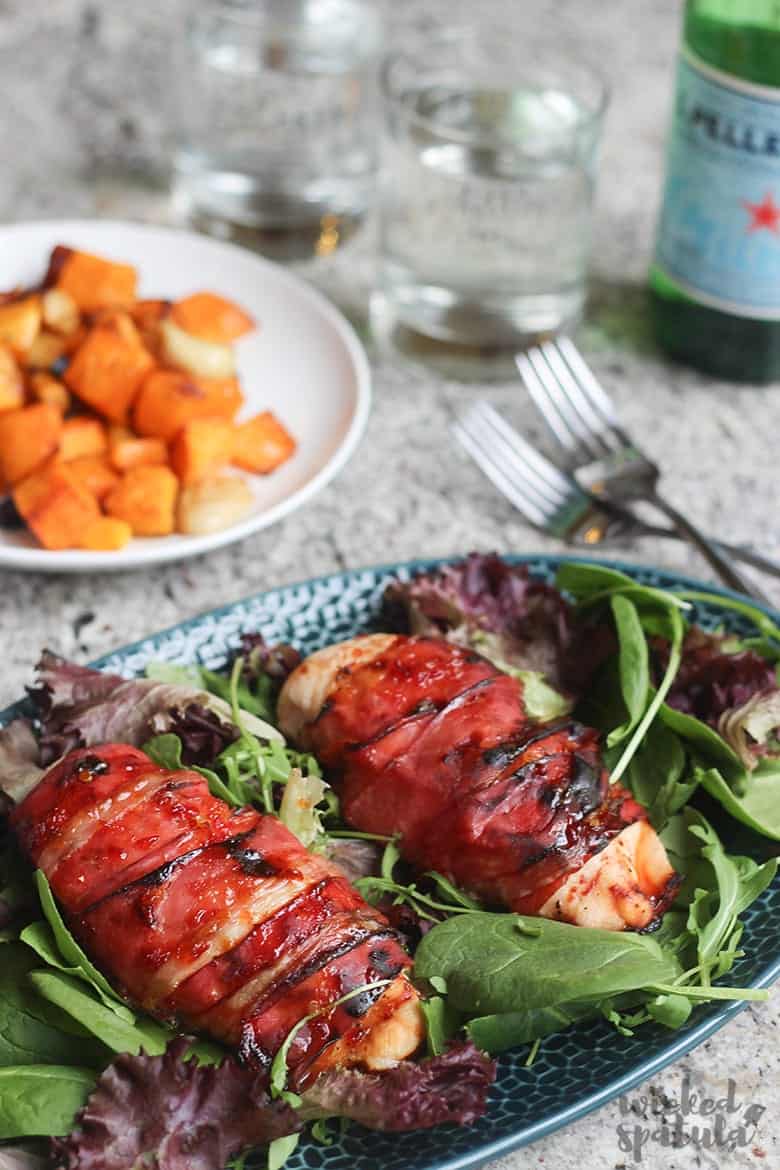 Prosciutto Wrapped Chicken Breast Recipe - Dinner Plate with chicken on bed or spinach