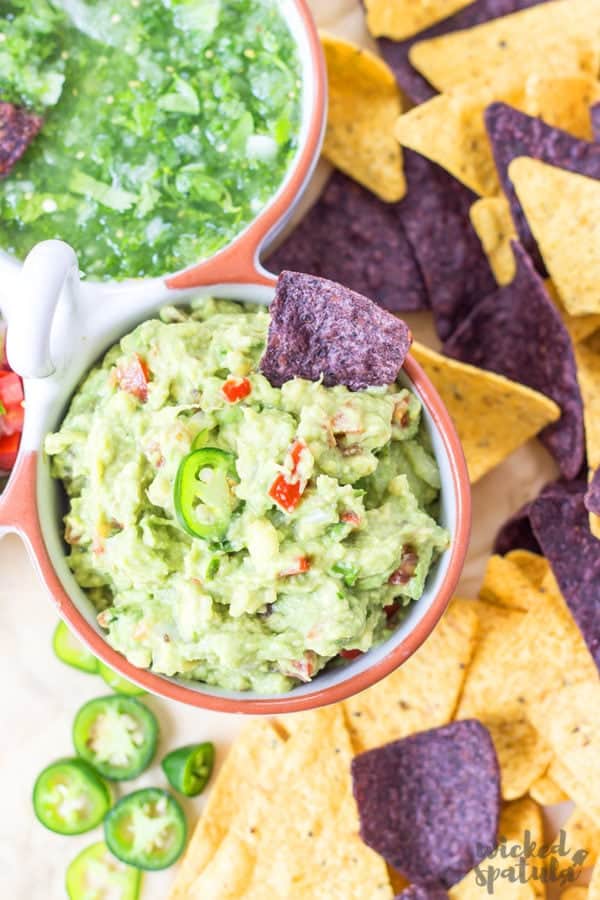 healthy guacamole with chips and tomatillo salsa