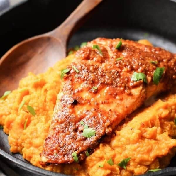 maple mustard glazed salmon in black bowl