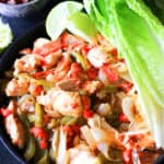 healthy chicken fajitas in a cast iron skillet