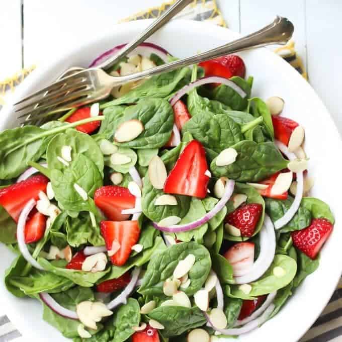 spinach strawberry salad recipe in a large plate