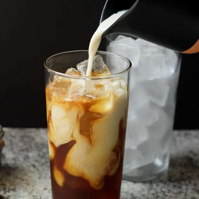 Skinny Iced Caramel Macchiato - Pouring almond milk