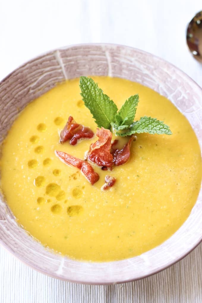 Cantaloupe Gazpacho with Frizzled Prosciutto in plate