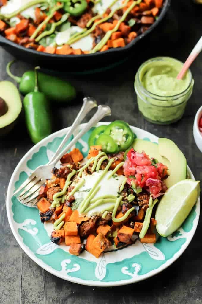 Sweet Potato Chorizo Hash with Eggs and Avocado Crema finished meal