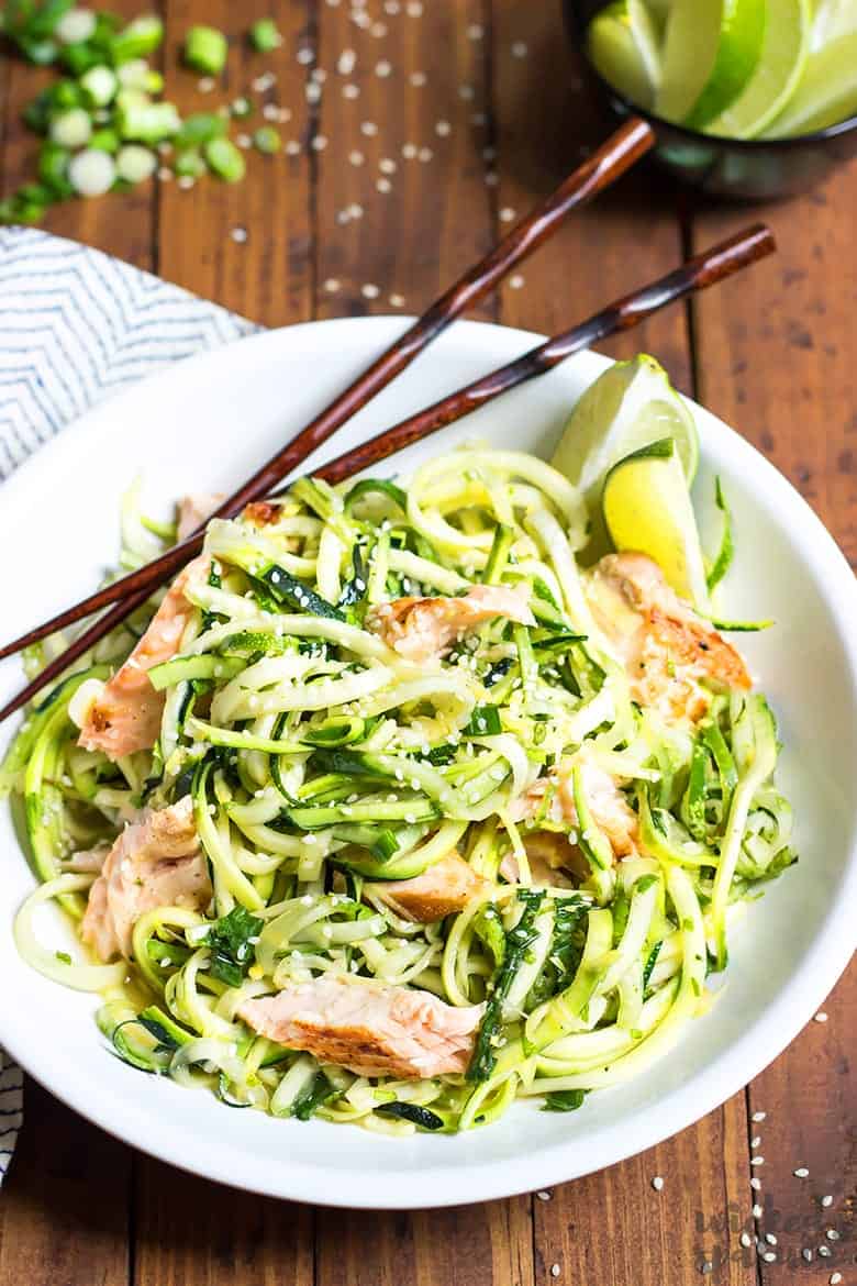 zucchini noodle salad recipe with salmon - in a bowl with chopsticks