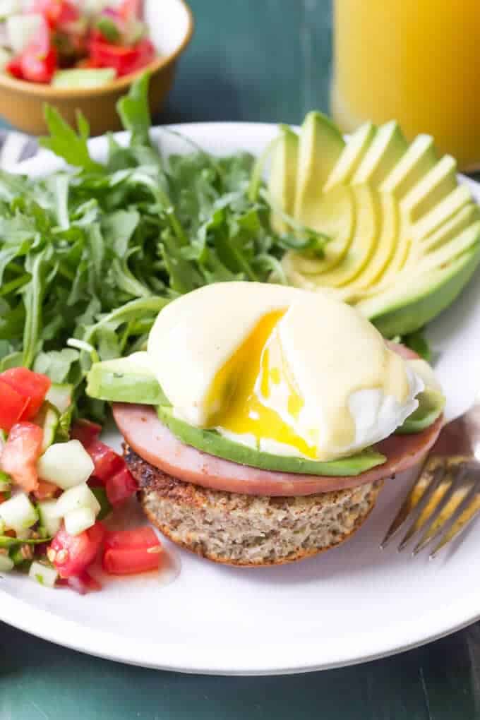 Paleo Eggs Benedict with Avocado and Cucumber Salsa eating