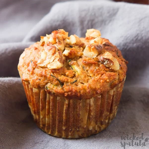 healthy zucchini muffins on grey background