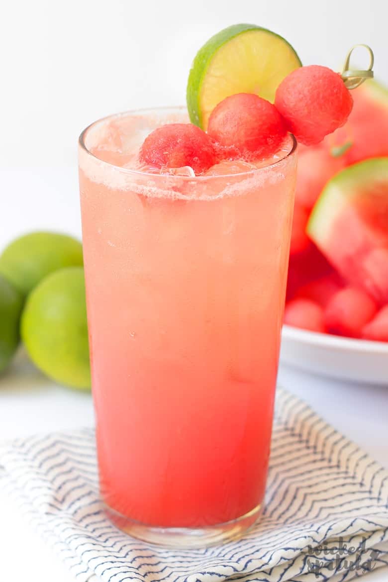 Watermelon lime coconut refresher with lime and watermelon garnish