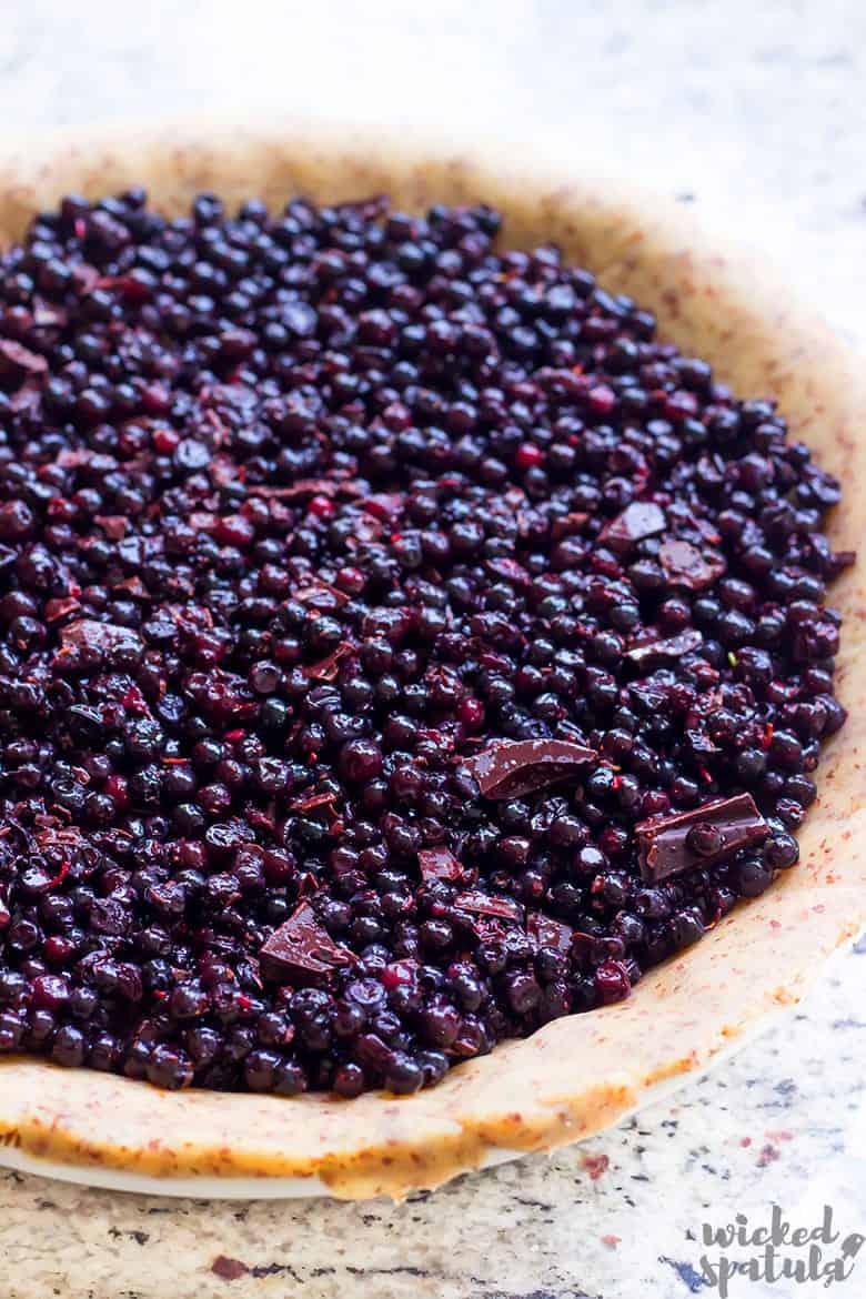 blueberries and chocolate in pie crust