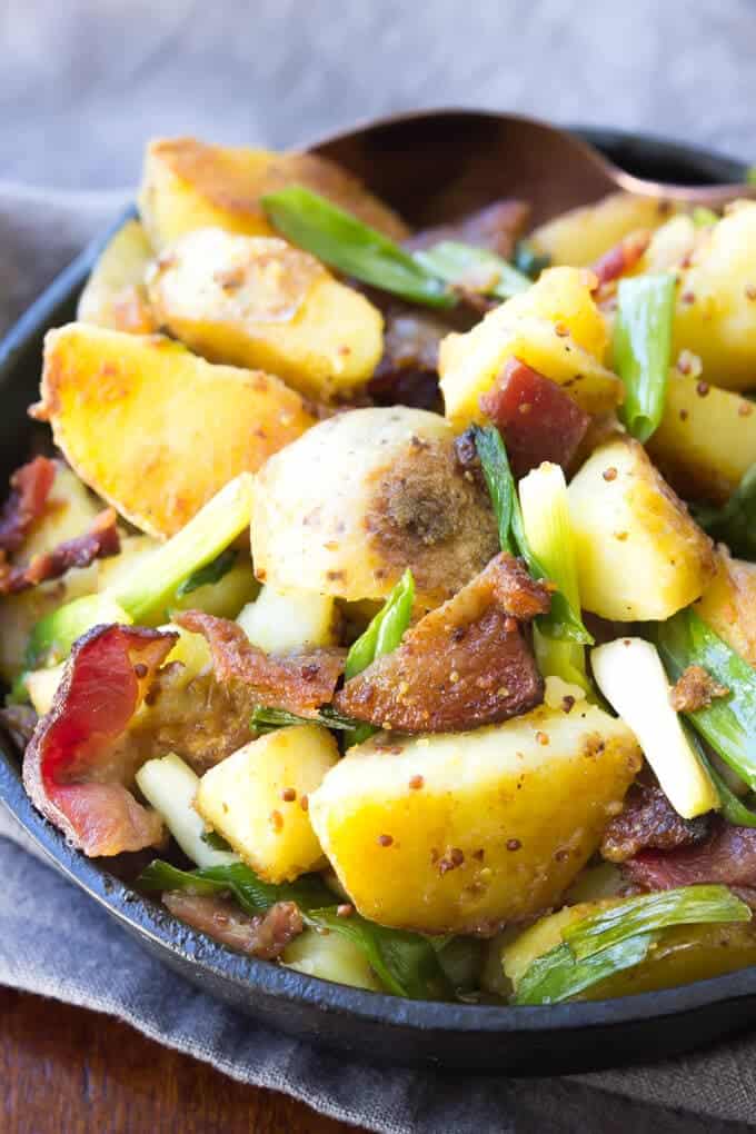 Close up photograph of German Fried Potatoes With Bacon And Onions