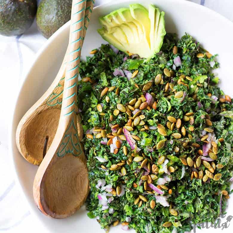 Vegan Kale Caesar Salad Recipe - salad in bowl with spoons