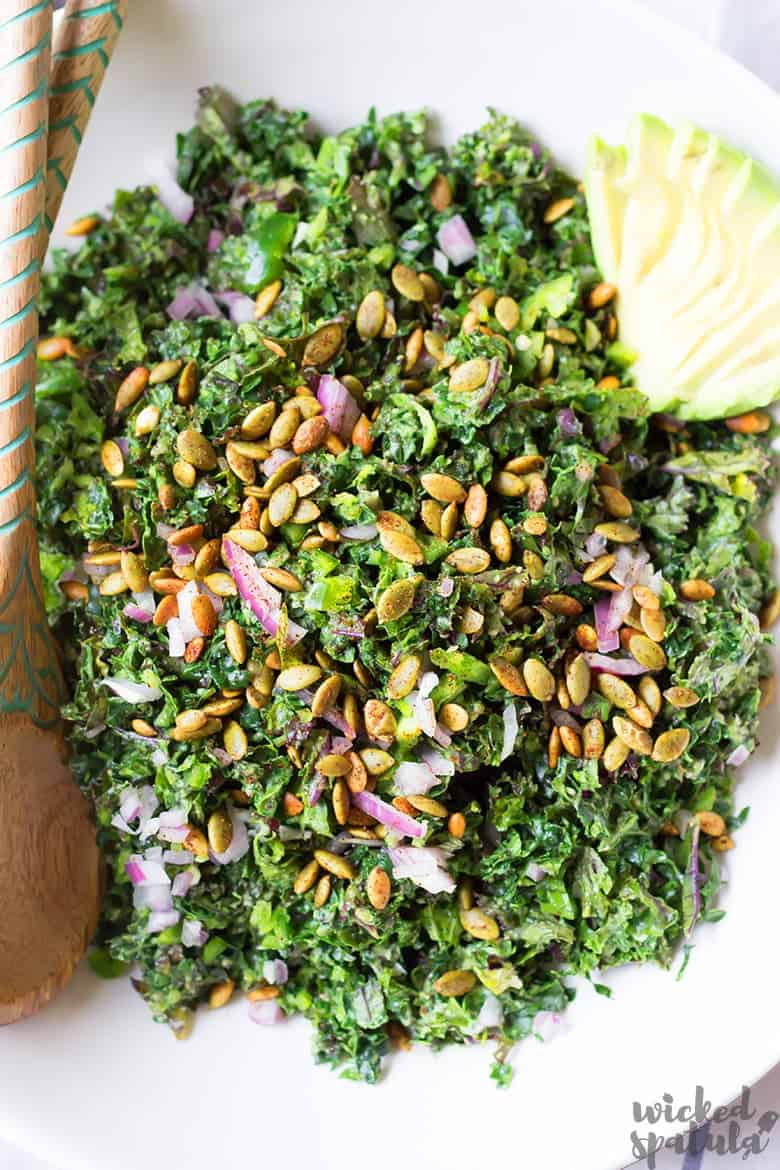 Vegan Kale Caesar Salad Recipe - salad with avocado and spoon