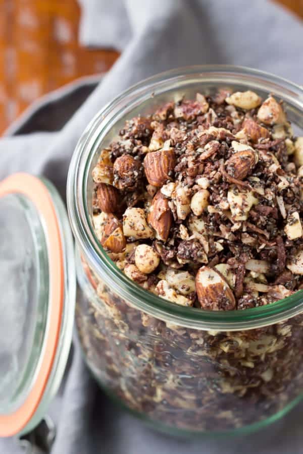 Paleo Chocolate Fudge Coconut Granola - this easy 30 minute granola is loaded with chocolate goodness and is low in sugar! Plus it's also vegan!