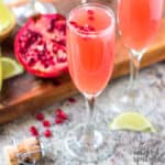 Mexican Pomegranate Mimosas in a champagne glass