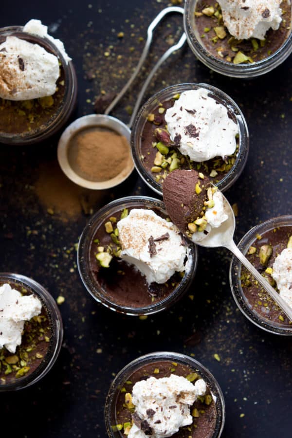 Mexican Chocolate Pots de Crème - Dairy Free and Paleo! This Paleo dessert is perfectly creamy and topped with crushed pistachios for a nice crunchy contrast.