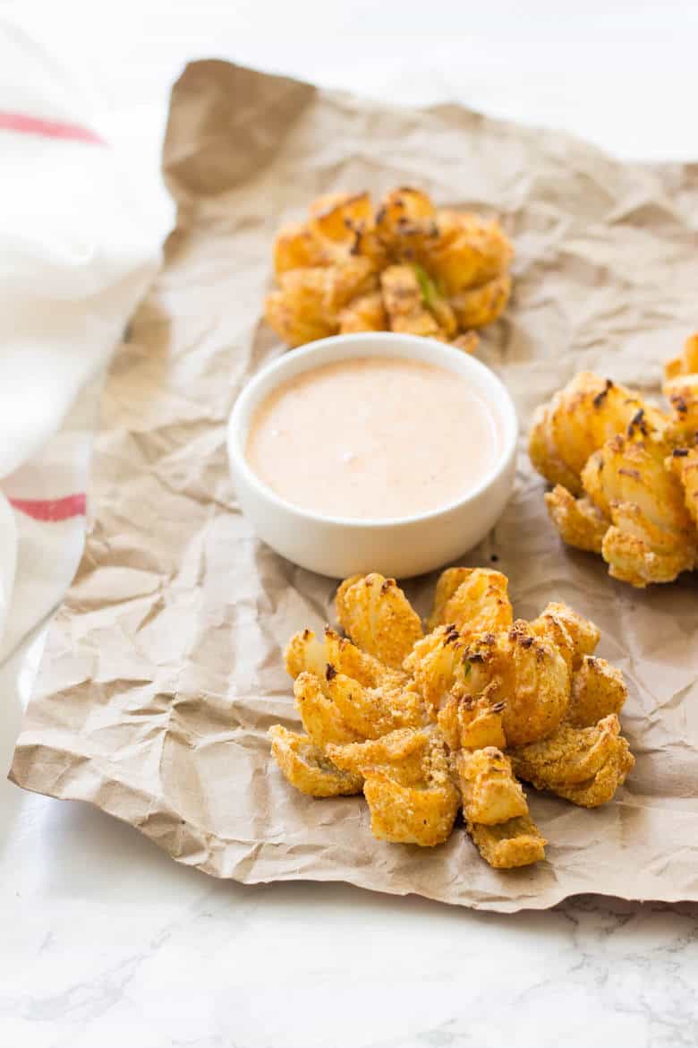 Easy Baked Blooming Onion Recipe - Ready to eat blooming onion with sauce