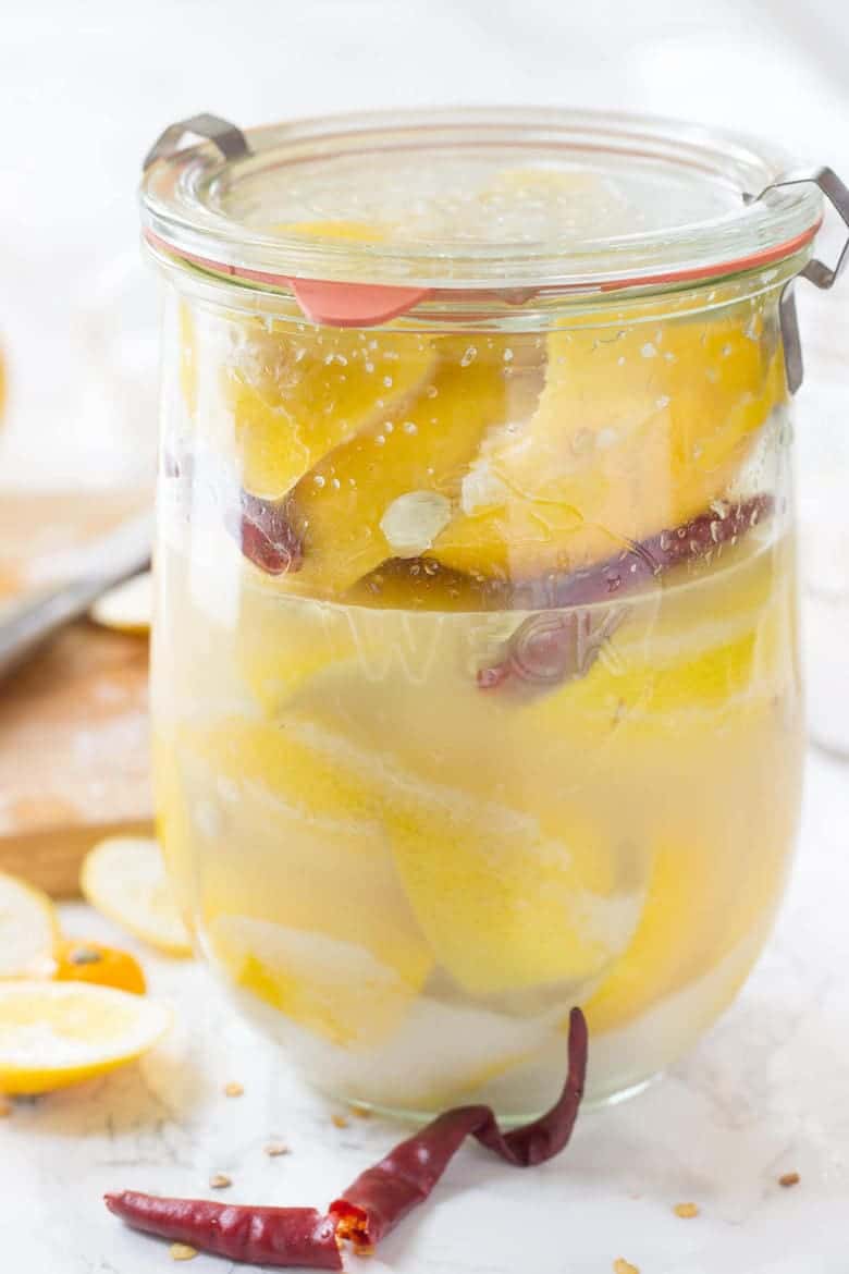 Preserved Meyer Lemons in a jar close-up