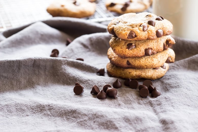 best paleo chocolate chip cookies in a stack on a cloth