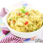 SloSlow Cooker Mexican Mashed Potatoes in a serving dish