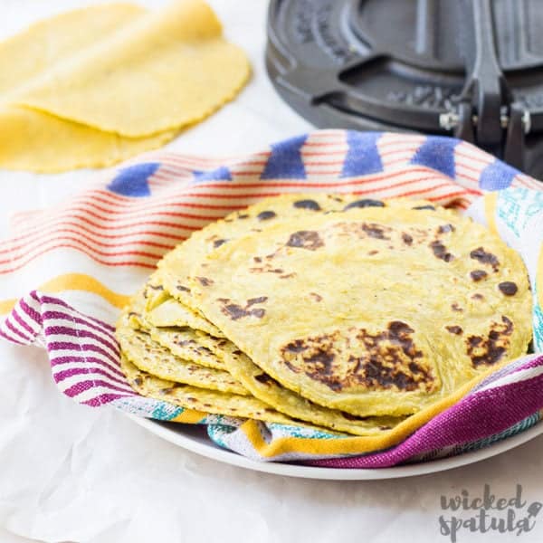 stack of plantain tortillas on dishcloth