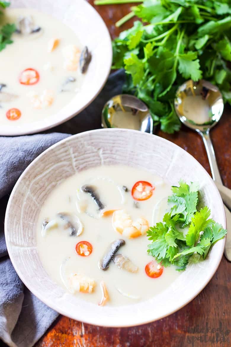 Thai shrimp soup in bowls with cilantro