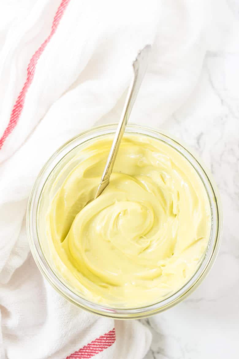 Overhead Shot Of Avocado Oil Mayo In Jar With Spoon