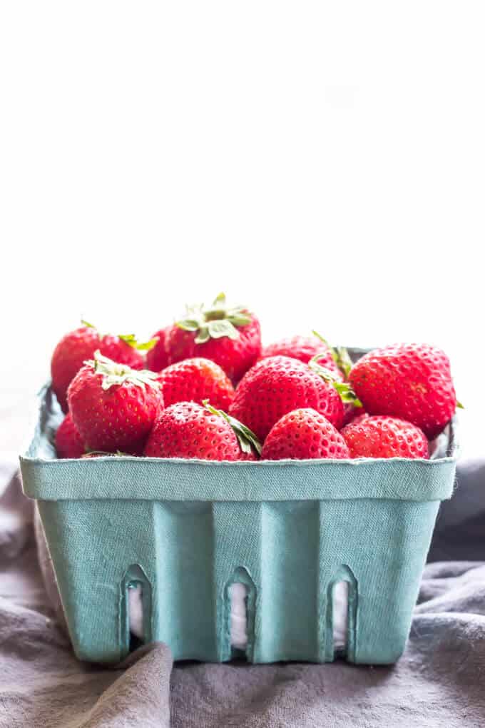 Side View Of Carton Of Fresh Strawberries