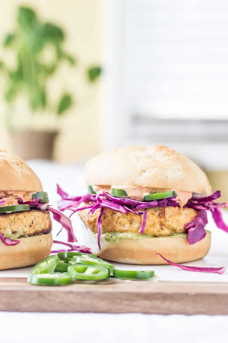 Side Facing Shot Of Paleo Cauliflower Burger With Bun And Slaw