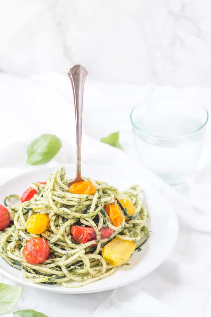 zucchini noodles with pesto and tomatoes