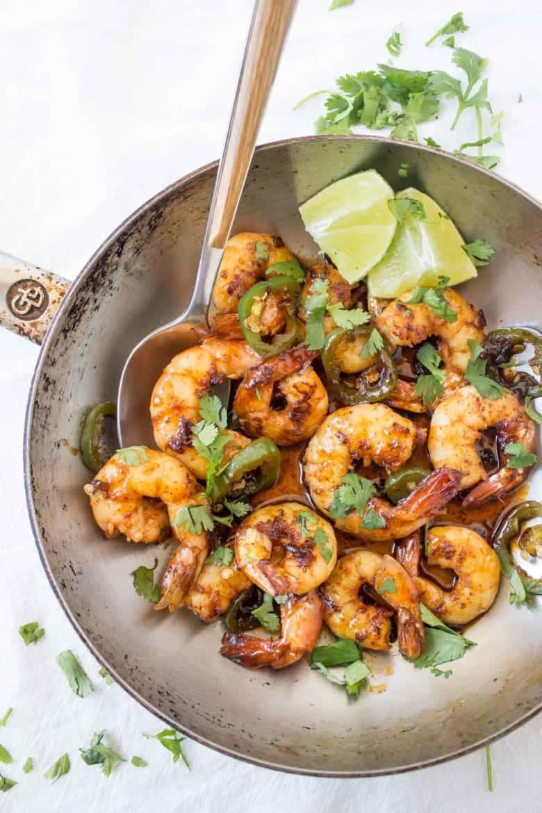 These 10-Minute Spicy Margarita Shrimp are bursting with sweet and spicy flavors. The get kicked up a notch with a splash of tequila!