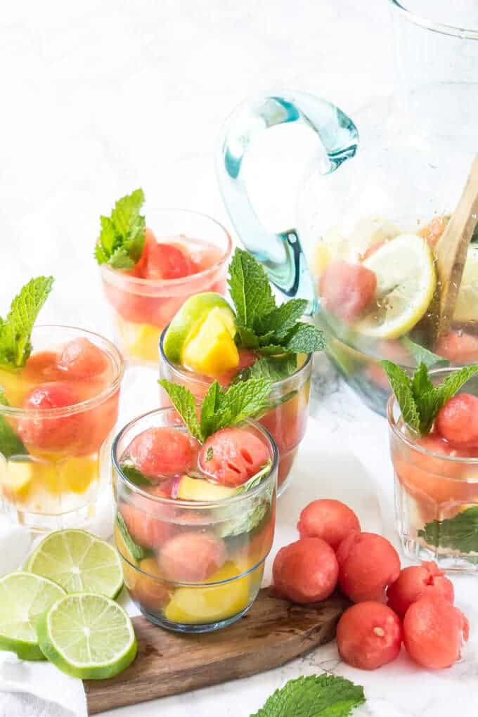 white wine sangria recipe in a clear pitcher