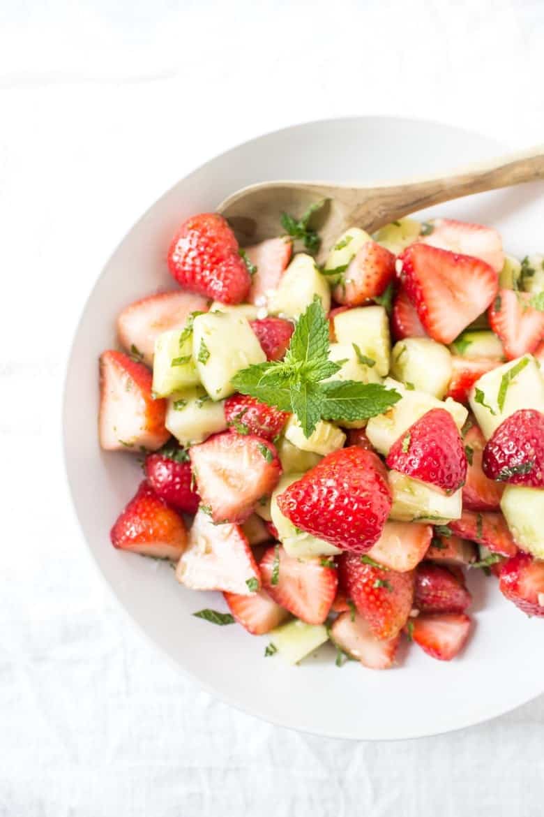Just a few of summer's favorite ingredients and 5 minutes is all you need to whip up this healthy and fresh Strawberry Mint Cucumber Salad!