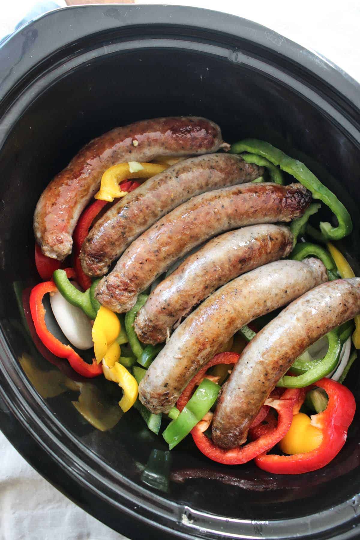 Overhead Shot Of Sausages In Crock Pot