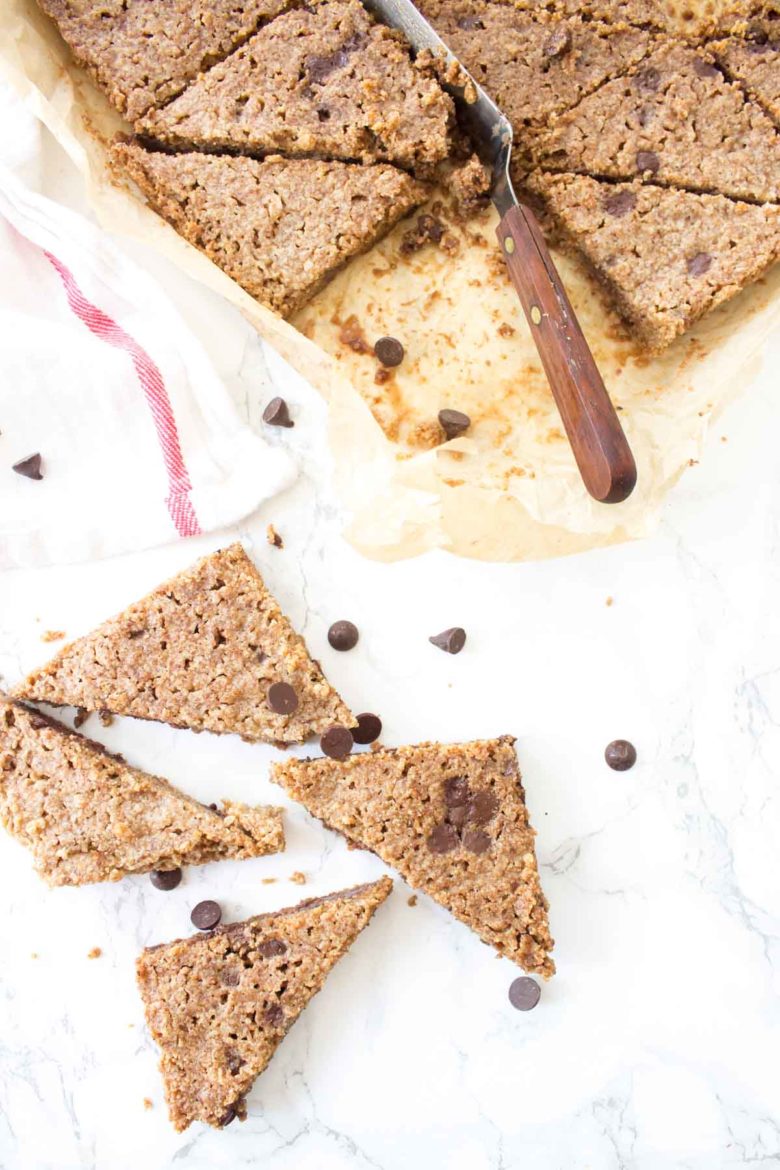 This Paleo Chocolate Chip Cookie Brittle is crunchy just like the outside of a perfectly baked cookie. All you need it one bowl & a few simple ingredients!