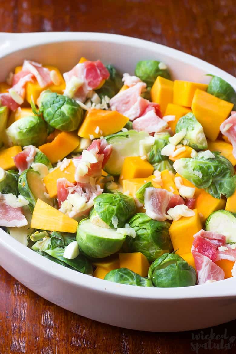 brussels sprouts and squash with bacon ready for roasting