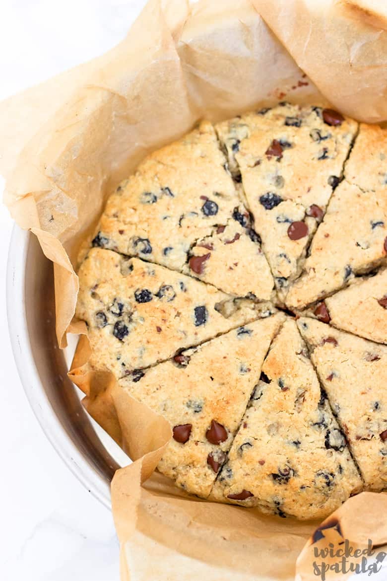 pie plate of vegan gluten-free scones with blueberries and chocolate