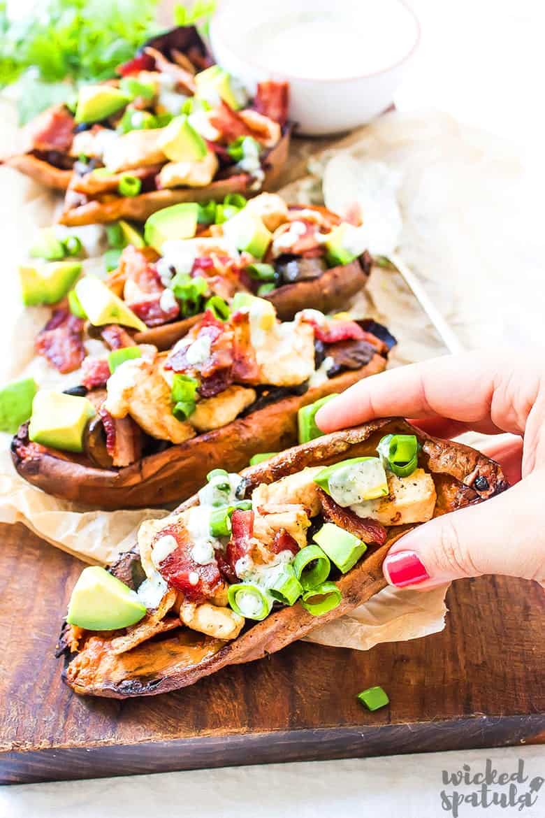 loaded potato skins in hand