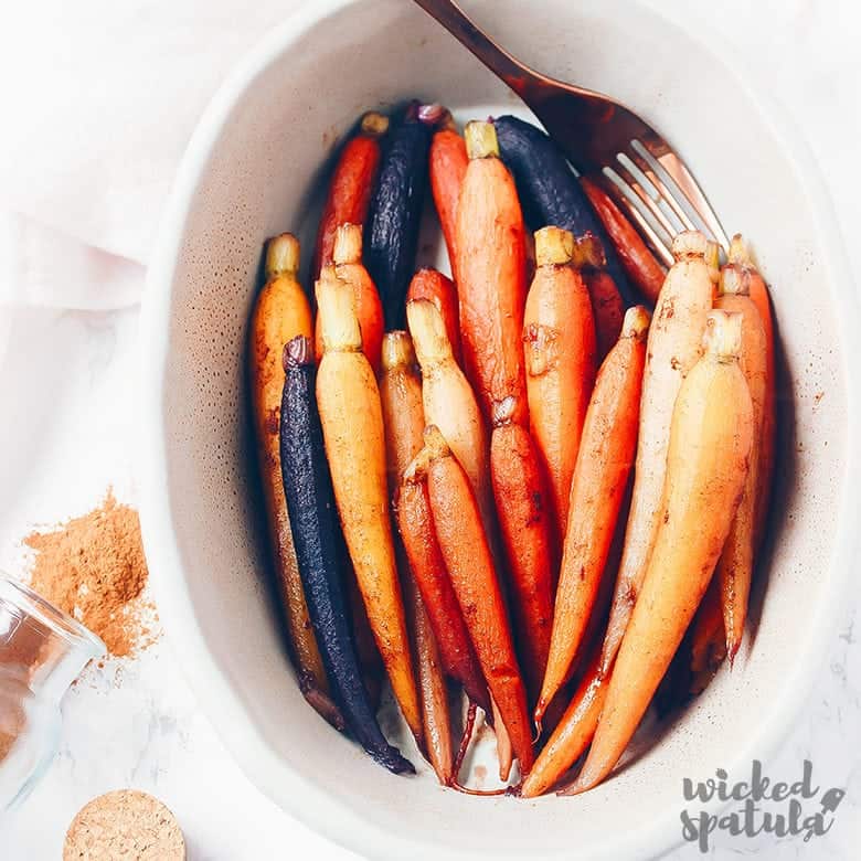 Cinnamon maple glazed carrots in dish