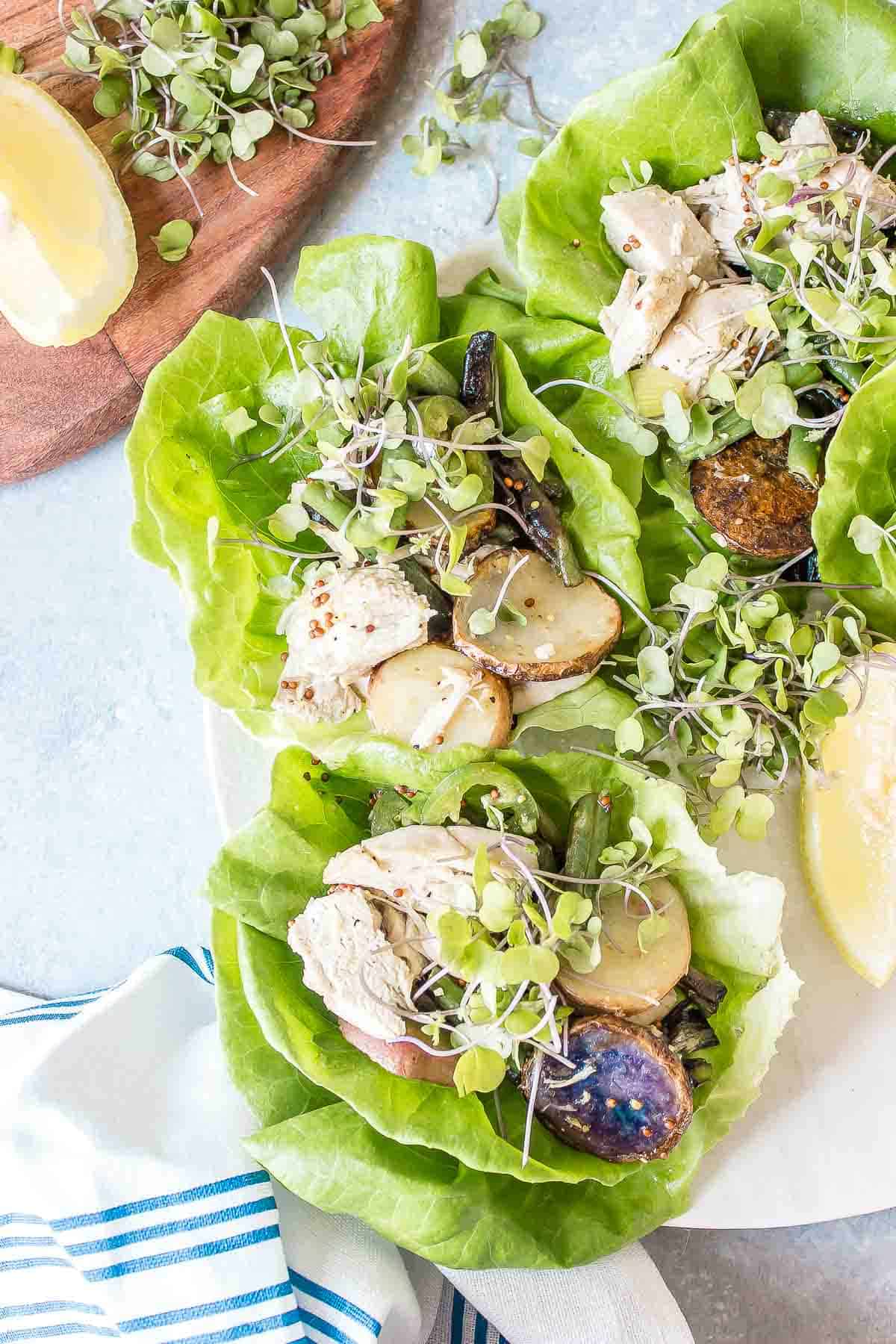 These Chicken, Potato, and Green Bean Lettuce Cups are packed full of flavor from the charred green onions and jalapenos to the tangy mustard dressing.