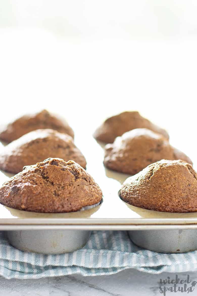 healthy pumpkin muffins in muffin tin