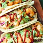 bang bang shrimp tacos in tortillas