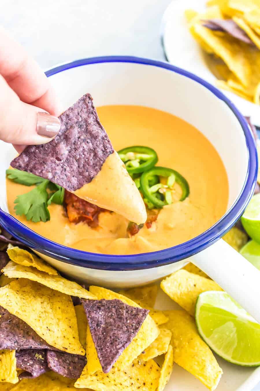 The Best Vegan Queso Recipe - Chip with queso