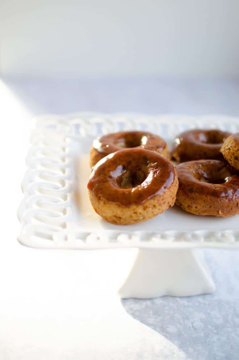 Maple Glazed Paleo Donut Recipe - Front View Image of Glazed Donuts on Cake Stand