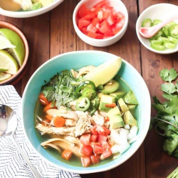 Chicken Caldo de Pollo bowl with toppings