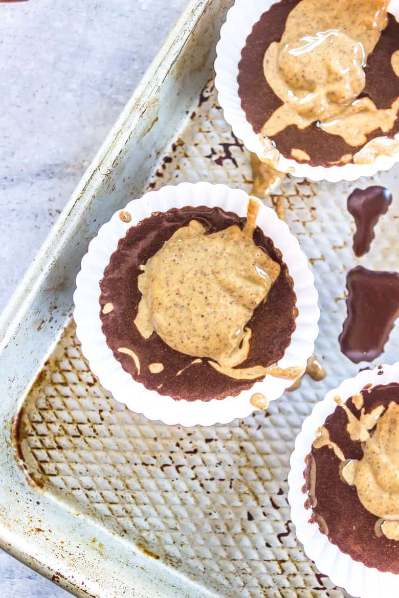 Overhead Shot Of Paleo Almond Butter Cup Mix In Paper Cups