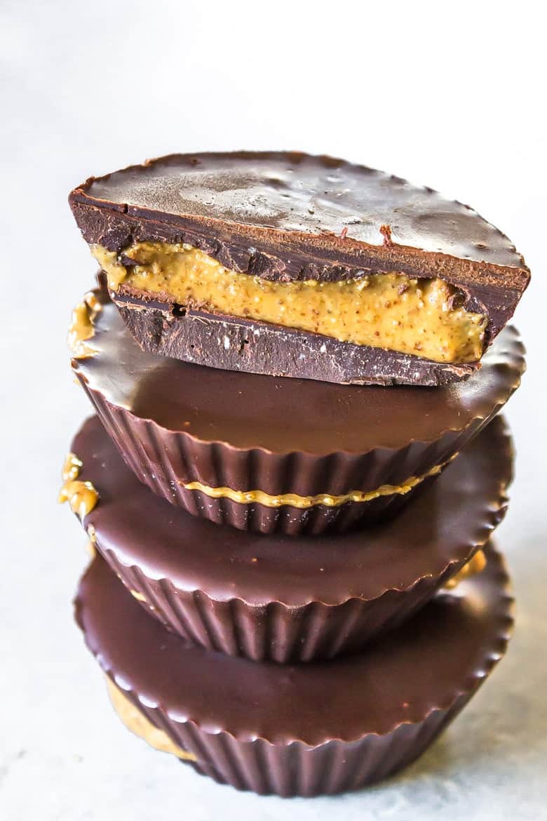 Stack Of Paleo Almond Butter Cups on White Background